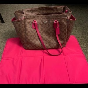 Coach diaper bag with changing pad